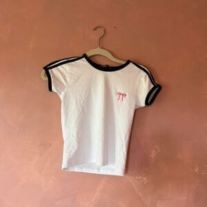 White and Black Shirt with Pink Logo